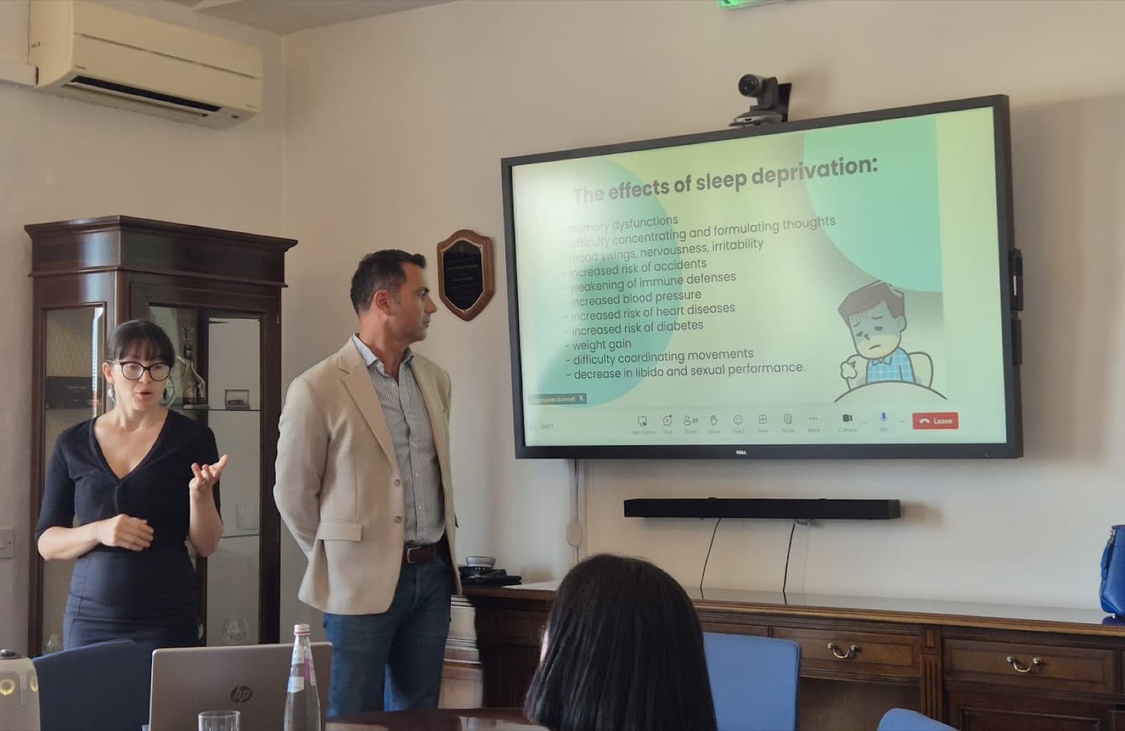 Eva presenting a workshop on the effects of sleep deprivation